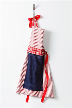 An apron handing on a hook Stock Photo - Premium Royalty-Free, Code: 659-06494053