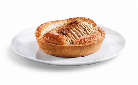 dessert apple slices - Mini Apple Tart; White Background Stock Photo - Premium Royalty-Free, Code: 659-06494127