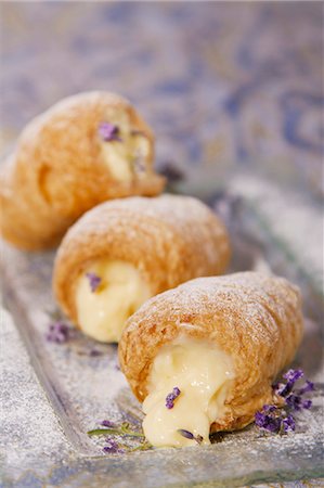 pastry on a plate - Puff pastry rolls filled with cream Stock Photo - Premium Royalty-Free, Code: 659-06494161