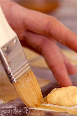 folding - Tortellini being made Stock Photo - Premium Royalty-Free, Code: 659-06494172