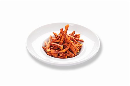 fries - Fried sweet potato sticks Stock Photo - Premium Royalty-Free, Code: 659-06494191