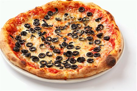 simsearch:659-06493987,k - A Pizza Margherita topped with black olives Stock Photo - Premium Royalty-Free, Code: 659-06494223