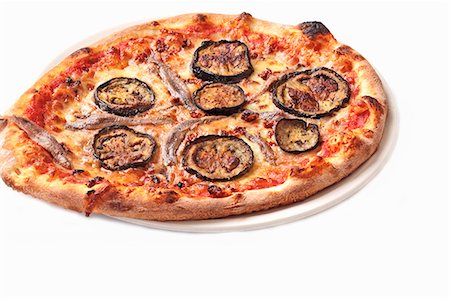 An aubergine and anchovy pizza Stock Photo - Premium Royalty-Free, Code: 659-06494238