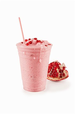 straw in drink - Pomegranate Shake with a Straw Stock Photo - Premium Royalty-Free, Code: 659-06494262