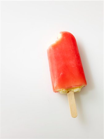 eis am stiel - An ice lolly with a bite taken out Stockbilder - Premium RF Lizenzfrei, Bildnummer: 659-06494330