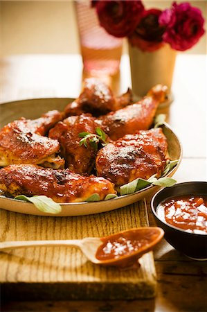 Roasted Chicken with Spicy Barbecue Sauce Stock Photo - Premium Royalty-Free, Code: 659-06494331