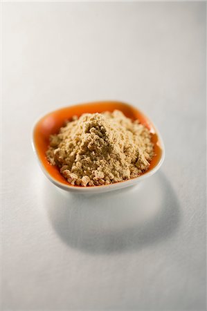 simsearch:659-07028527,k - A bowl of ground ginger Stock Photo - Premium Royalty-Free, Code: 659-06494356