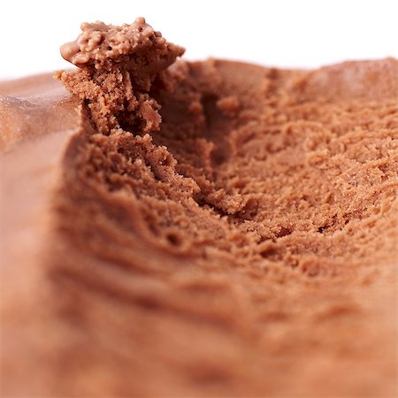 simsearch:659-06494432,k - Traces left by an ice cream scoop in a container of homemade chocolate ice cream Stock Photo - Premium Royalty-Free, Code: 659-06494435