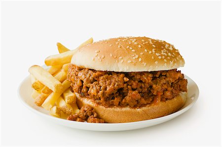 Sloppy Joe with French Fries; White Background Stock Photo - Premium Royalty-Free, Code: 659-06494468