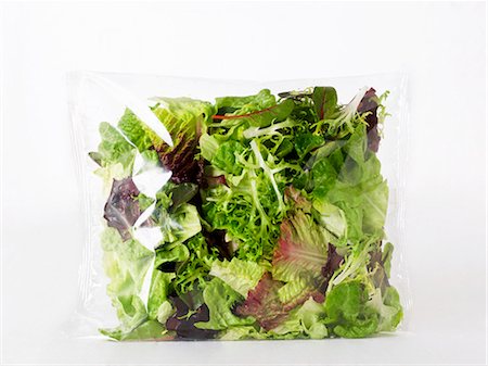 Mixed green salad in a plastic bag Stock Photo - Premium Royalty-Free, Code: 659-06494665