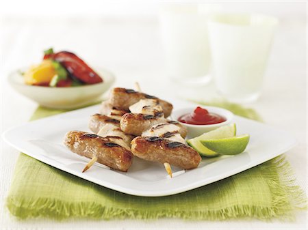 sausage food - Grilled sausage and chicken kebabs Stock Photo - Premium Royalty-Free, Code: 659-06494726