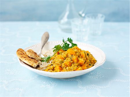 pan recipe - Vegetable curry with rice and unleavened bread Foto de stock - Sin royalties Premium, Código: 659-06494751