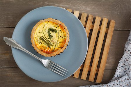 A mini quiche with herbs Stock Photo - Premium Royalty-Free, Code: 659-06494845