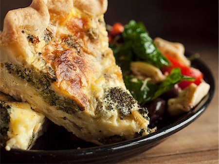 food and drink photography - Piece of Broccoli Quiche with a Side Salad Stock Photo - Premium Royalty-Free, Code: 659-06494973