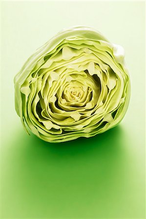 Half a white cabbage Fotografie stock - Premium Royalty-Free, Codice: 659-06495021