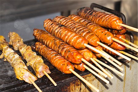 simsearch:659-06494707,k - Pork and Chorizo Kabobs on a Food Cart Stock Photo - Premium Royalty-Free, Code: 659-06495034