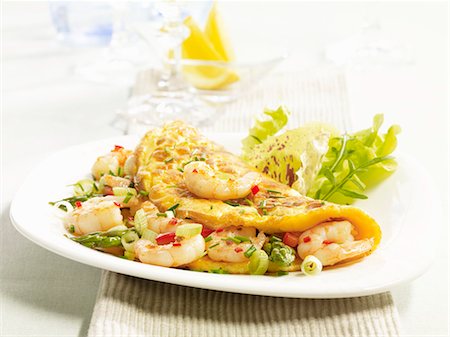 shrimp (food) - An omelette with king prawns and asparagus Stock Photo - Premium Royalty-Free, Code: 659-06495048