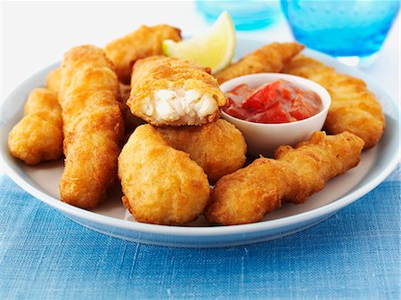 fried fish food - Haddock goujons Stock Photo - Premium Royalty-Free, Code: 659-06495195