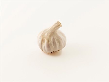 A garlic bulb Foto de stock - Sin royalties Premium, Código: 659-06495192