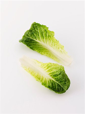 simsearch:659-06307084,k - Two cos lettuce leaves Foto de stock - Sin royalties Premium, Código: 659-06495243