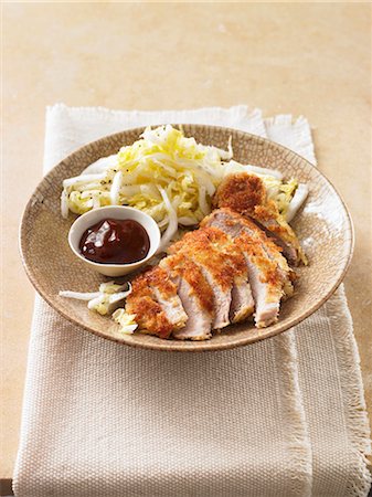 poultry breast - Breaded chicken breast with cabbage salad and barbecue sauce Stock Photo - Premium Royalty-Free, Code: 659-06495313