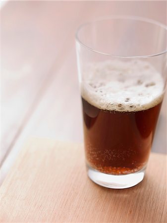 A glass of dark beer Stock Photo - Premium Royalty-Free, Code: 659-06495346