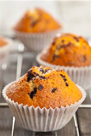 food with pastry - Chocolate chip muffins Stock Photo - Premium Royalty-Free, Code: 659-06495369