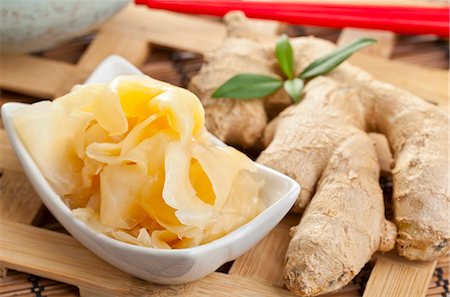 simsearch:659-06185365,k - Gari - ginger marinated in soy sauce - with a piece of ginger next to it Stock Photo - Premium Royalty-Free, Code: 659-06495376
