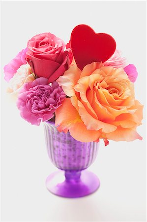 pink, rose, white background - Various flowers and a heart in a purple vase Stock Photo - Premium Royalty-Free, Code: 659-06495644