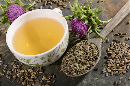 Milk thistle (tea, tea leaves, a flower and seeds) Stock Photo - Premium Royalty-Free, Code: 659-06495754