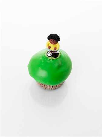 simsearch:614-02242312,k - A cupcake decorated with a sugar figure Foto de stock - Sin royalties Premium, Código: 659-06493790