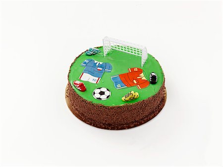 food decoration cake - A birthday cake decorated with football motifs Stock Photo - Premium Royalty-Free, Code: 659-06493834