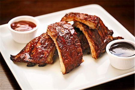 pork meat - Ribs, Close Up, with Barbecue Sauce Stock Photo - Premium Royalty-Free, Code: 659-06493865