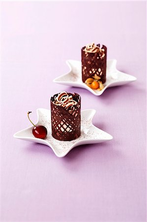 simsearch:659-06152035,k - A layered dessert in a chocolate cage Stock Photo - Premium Royalty-Free, Code: 659-06493890