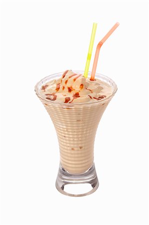 A caramel shake with two straws Stock Photo - Premium Royalty-Free, Code: 659-06493942