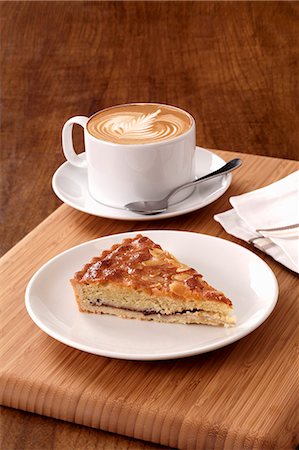 simsearch:659-06671463,k - Cappuccino and almond tart Stock Photo - Premium Royalty-Free, Code: 659-06493963