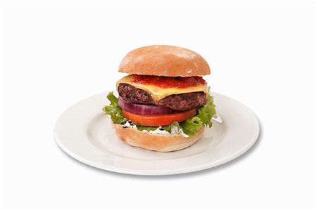 Cheeseburger Stock Photo - Premium Royalty-Free, Code: 659-06493987