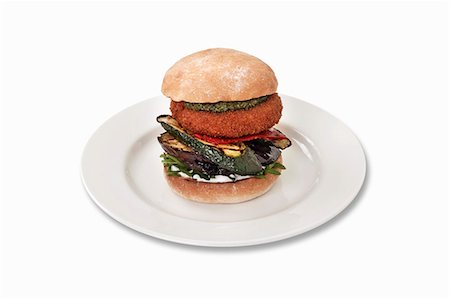 simsearch:659-06493987,k - Goat's cheese burger with grilled courgette, aubergines and pesto Stock Photo - Premium Royalty-Free, Code: 659-06493994