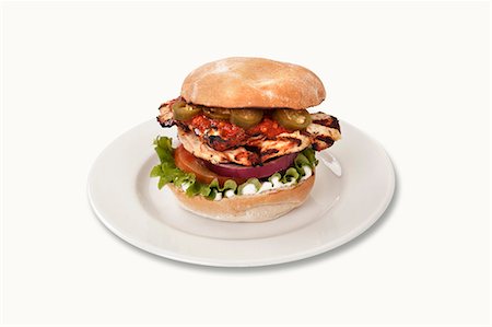 simsearch:859-06538293,k - A chicken burger with jalapeños and chilli sauce Foto de stock - Sin royalties Premium, Código: 659-06493991