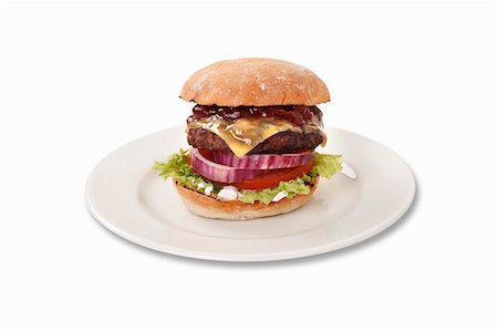 simsearch:659-06493987,k - A cheeseburger with barbecue sauce Stock Photo - Premium Royalty-Free, Code: 659-06493992