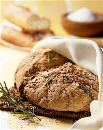 rosemary sprig - Pagnotta (wood oven bread with rosemary and sea salt, Italy) Stock Photo - Premium Royalty-Free, Code: 659-06670942