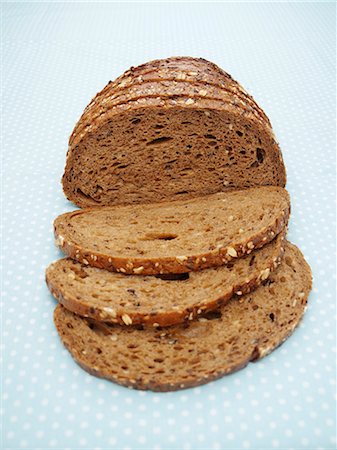 simsearch:659-03527834,k - Slices of Whole Grain Bread on a Plate Stock Photo - Premium Royalty-Free, Code: 659-06670962