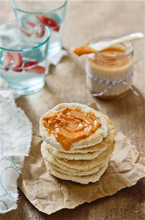 spread bread - Peanut and chilli sauce in a jar and on unleavened bread Stock Photo - Premium Royalty-Free, Code: 659-06670971