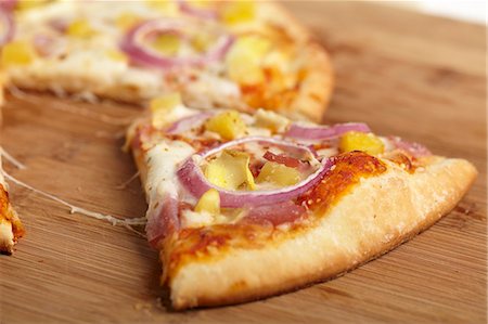 fruit pizza - Slice of Hawaiian Pizza; Close Up Stock Photo - Premium Royalty-Free, Code: 659-06671047