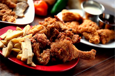 Fried Chicken with French Fries Foto de stock - Sin royalties Premium, Código: 659-06671187