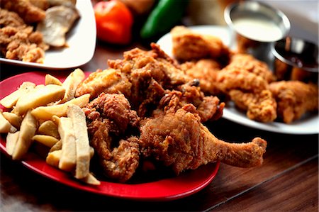 Fried Chicken with French Fries Stock Photo - Premium Royalty-Free, Code: 659-06671187