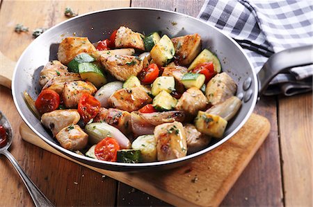 fryed - Chicken breast with tomatoes and courgette Stock Photo - Premium Royalty-Free, Code: 659-06671286