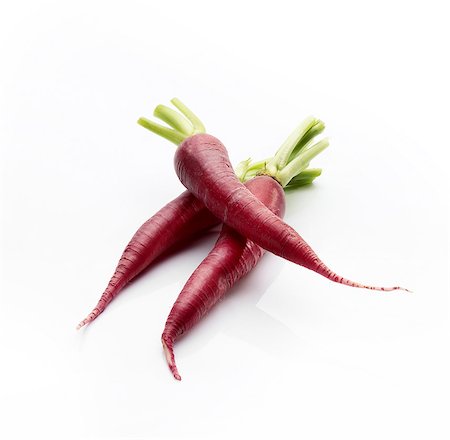 purple - Three purple carrots (Purple Haze) Foto de stock - Sin royalties Premium, Código: 659-06671328