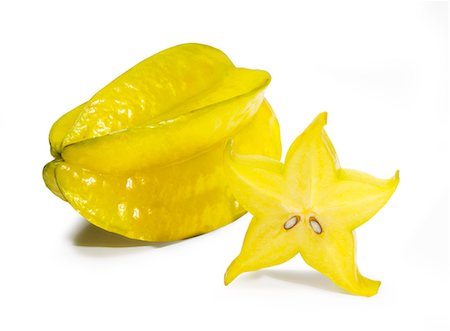 simsearch:659-06902616,k - A whole star fruit and a slice of star fruit Photographie de stock - Premium Libres de Droits, Code: 659-06671331