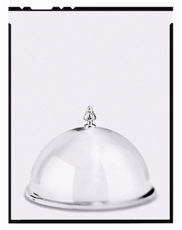 plain (simple) - A silver cloche topped with a miniature tree Stock Photo - Premium Royalty-Free, Code: 659-06671458